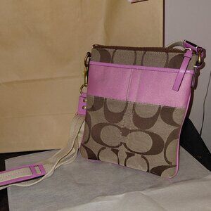 Coach canvas Swingpack with pink detail
